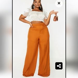 Pretty Little Things- Rust Pleated Wide Legged Trouser size 14